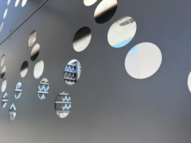 Perforation detail of the Art House garage screens.